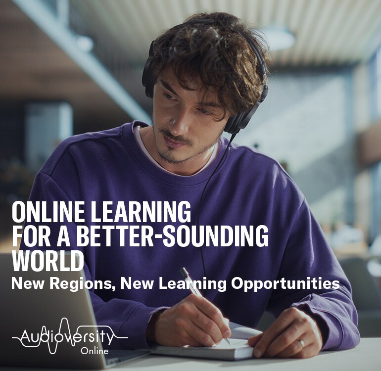 Key visual for Audioversity Online: a man focused on an online training session.