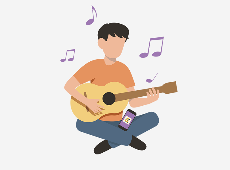 En mann som bruker musikkøvelsesappen Extrack til å øve med akkordoversikter