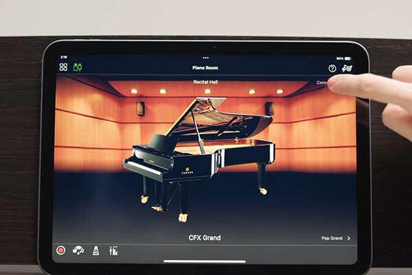 En nettbrettskjerm som viser Smart Pianist-appen i bruk